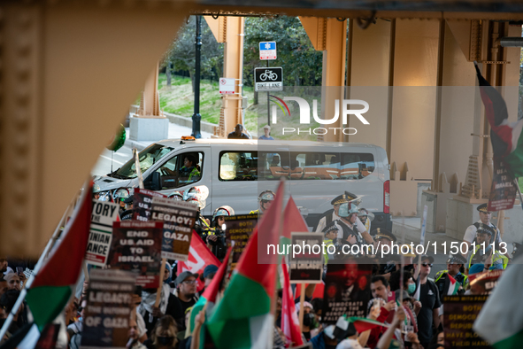 Pro-Palestinian activists marched through the streets of Chicago on August 21, 2024, to protest the Democratic National Committee's conventi...