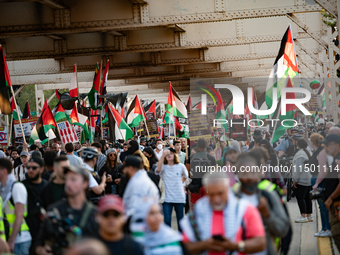 Pro-Palestinian activists marched through the streets of Chicago on August 21, 2024, to protest the Democratic National Committee's conventi...