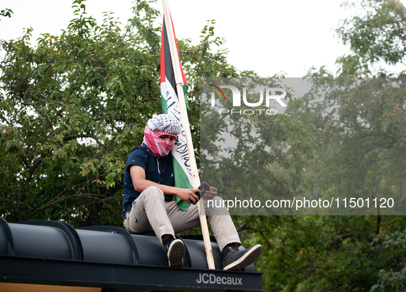 Pro-Palestinian activists marched through the streets of Chicago on August 21, 2024, to protest the Democratic National Committee's conventi...