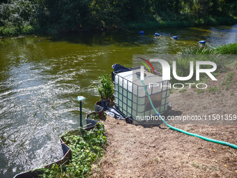 An experiment involving dosing hydrogen peroxide (H2O2), a water treatment agent, into the Klodnica River, Plawniowice, southern Poland on A...