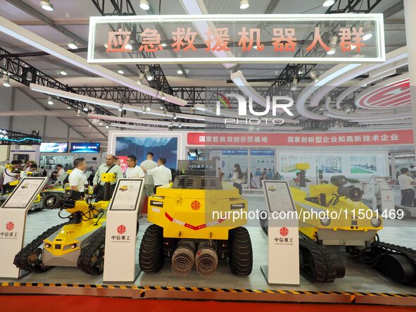 Visitors view an ''emergency rescue robot'' at the 2024 World Robot Conference in Beijing, China, on August 22, 2024. 