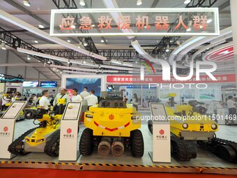 Visitors view an ''emergency rescue robot'' at the 2024 World Robot Conference in Beijing, China, on August 22, 2024. (