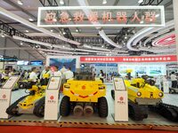 Visitors view an ''emergency rescue robot'' at the 2024 World Robot Conference in Beijing, China, on August 22, 2024. (