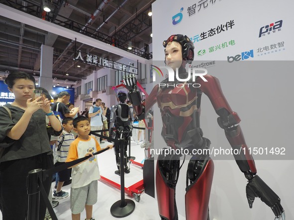 Visitors view a ''humanoid robot'' at the 2024 World Robot Conference in Beijing, China, on August 22, 2024. 