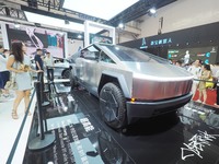 Visitors view the ''Tesla Cybertruck'' at the 2024 World Robot Conference in Beijing, China, on August 22, 2024. (