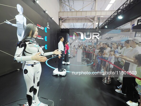 Visitors view a ''humanoid robot'' at the 2024 World Robot Conference in Beijing, China, on August 22, 2024. 