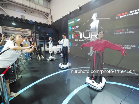 Visitors view a ''humanoid robot'' at the 2024 World Robot Conference in Beijing, China, on August 22, 2024. 