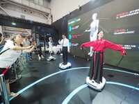 Visitors view a ''humanoid robot'' at the 2024 World Robot Conference in Beijing, China, on August 22, 2024. (