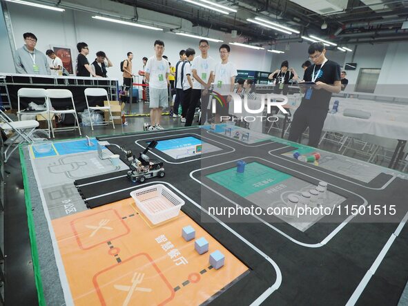 Young players compete at the 2024 World Robot Competition in Beijing, China, on August 22, 2024. 