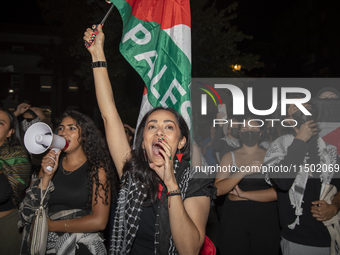 Protesters chant while joining a pro-Palestinian demonstration at George Washington University in Washington, D.C., on August 22, 2024. Duri...