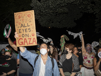 Protesters chant while joining a pro-Palestinian demonstration at George Washington University in Washington, D.C., on August 22, 2024. Duri...