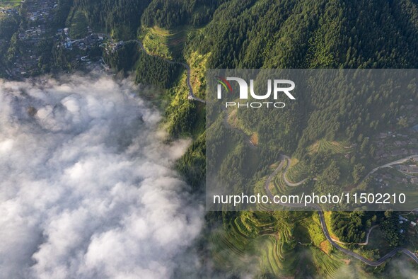 An aerial photo shows a rural road in Baidao village, Congjiang county, in Congjiang, China, on August 22, 2024. 