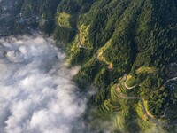 An aerial photo shows a rural road in Baidao village, Congjiang county, in Congjiang, China, on August 22, 2024. (