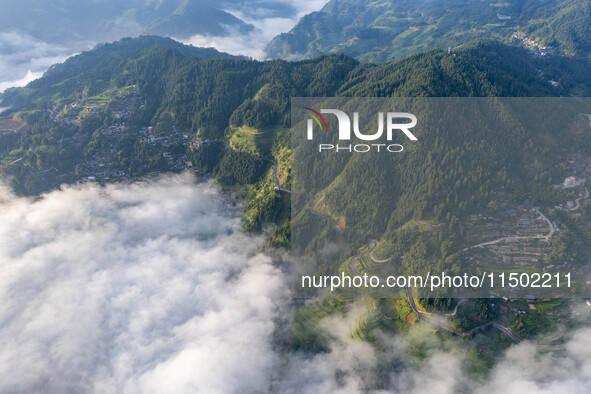 An aerial photo shows a rural road in Baidao village, Congjiang county, in Congjiang, China, on August 22, 2024. 