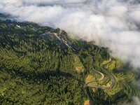 An aerial photo shows a rural road in Baidao village, Congjiang county, in Congjiang, China, on August 22, 2024. (