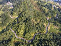 An aerial photo shows a rural road in Baidao village, Congjiang county, in Congjiang, China, on August 22, 2024. (