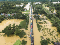 An aerial view of the flooded Dhaka-Chittagong Highway in the Muhuriganj area of Feni district in the Chittagong division of Bangladesh. At...