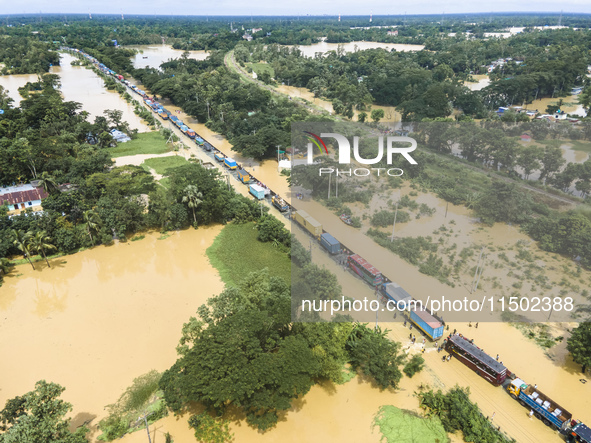 An aerial view of the flooded Dhaka-Chittagong Highway in the Muhuriganj area of Feni district in the Chittagong division of Bangladesh. At...