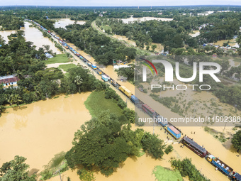 An aerial view of the flooded Dhaka-Chittagong Highway in the Muhuriganj area of Feni district in the Chittagong division of Bangladesh. At...