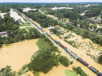 An aerial view of the flooded Dhaka-Chittagong Highway in the Muhuriganj area of Feni district in the Chittagong division of Bangladesh. At...