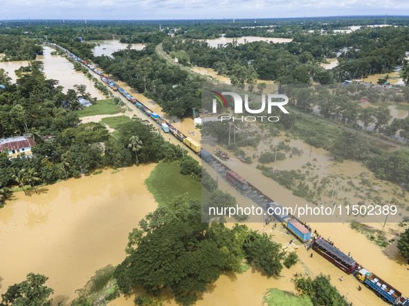 An aerial view of the flooded Dhaka-Chittagong Highway in the Muhuriganj area of Feni district in the Chittagong division of Bangladesh. At...