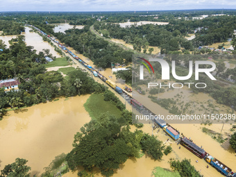 An aerial view of the flooded Dhaka-Chittagong Highway in the Muhuriganj area of Feni district in the Chittagong division of Bangladesh. At...