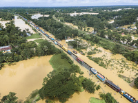 An aerial view of the flooded Dhaka-Chittagong Highway in the Muhuriganj area of Feni district in the Chittagong division of Bangladesh. At...