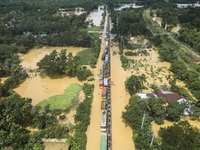 An aerial view of the flooded Dhaka-Chittagong Highway in the Muhuriganj area of Feni district in the Chittagong division of Bangladesh. At...