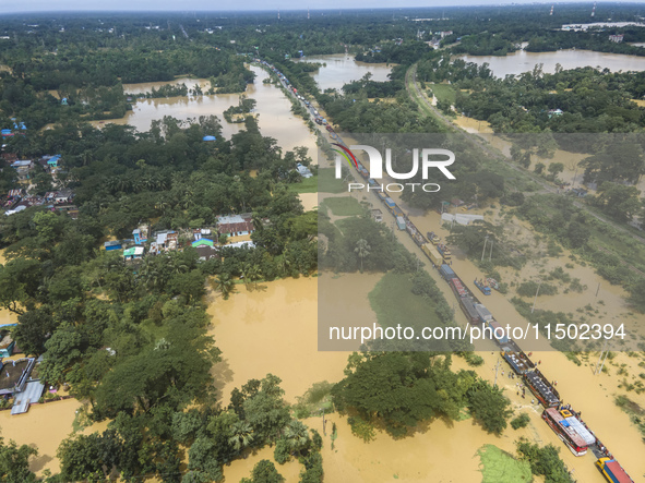 An aerial view of the flooded Dhaka-Chittagong Highway in the Muhuriganj area of Feni district in the Chittagong division of Bangladesh. At...