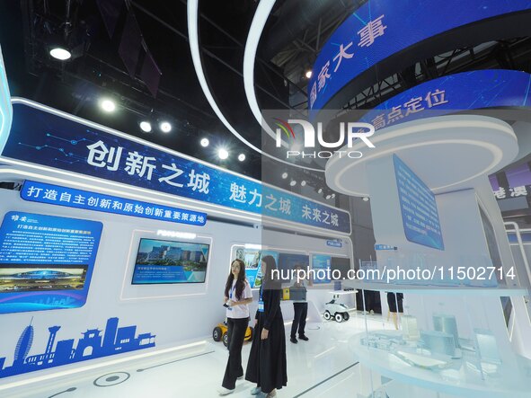 Visitors visit the Xiongan exhibition area of HICOOL 2024 Global Entrepreneurs Summit in Beijing, China, on August 23, 2024. 