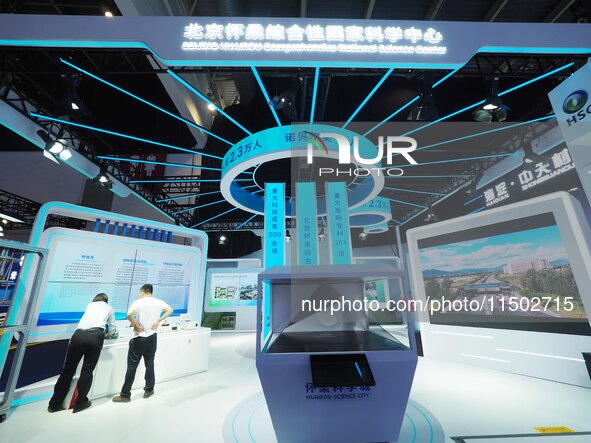 Visitors visit the exhibition area of HICOOL 2024 Global Entrepreneurs Summit at Beijing Huairou Comprehensive National Science Center in Be...