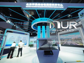 Visitors visit the exhibition area of HICOOL 2024 Global Entrepreneurs Summit at Beijing Huairou Comprehensive National Science Center in Be...