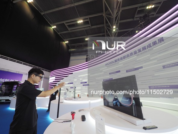 Visitors experience ''AR technology'' at the HICOOL 2024 Global Entrepreneur Summit in Beijing, China, on August 23, 2024. 