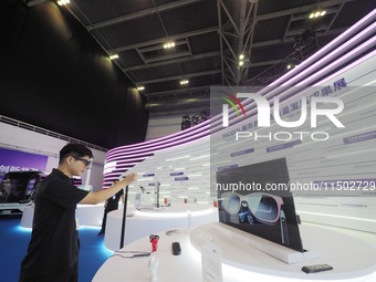 Visitors experience ''AR technology'' at the HICOOL 2024 Global Entrepreneur Summit in Beijing, China, on August 23, 2024. (