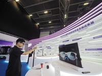 Visitors experience ''AR technology'' at the HICOOL 2024 Global Entrepreneur Summit in Beijing, China, on August 23, 2024. (