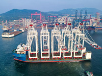 The first five ultra-large shore cranes are sent to Egypt at the West Coast New Area in Qingdao, Shandong province, China, on August 23, 202...