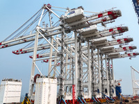 The first five ultra-large shore cranes are sent to Egypt at the West Coast New Area in Qingdao, Shandong province, China, on August 23, 202...