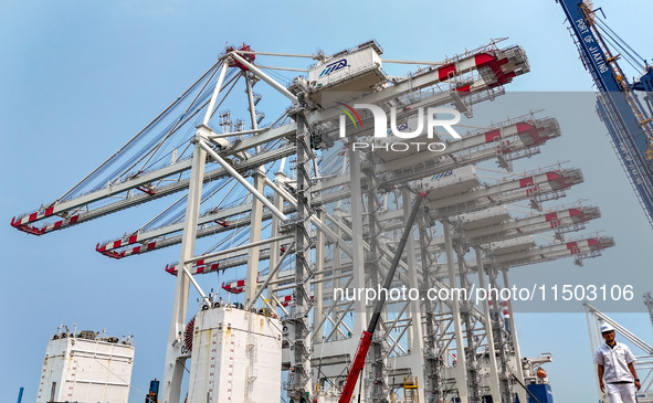 The first five ultra-large shore cranes are sent to Egypt at the West Coast New Area in Qingdao, Shandong province, China, on August 23, 202...