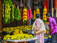 Flowers and floral garlands are for sale at the Chalai market in Thiruvananthapuram, Kerala, India, on April 13, 2024. The Chalai Market (Ch...