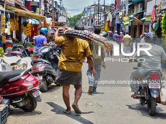 A busy street in the Chalai market in Thiruvananthapuram, Kerala, India, on April 13, 2024. The Chalai Market (Chalai bazaar) is Kerala's ol...