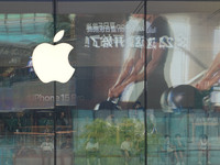 People experience products at the Apple flagship store at Taikoo Li in Sanlitun, a trendy fashion district in Beijing, China, on August 18,...