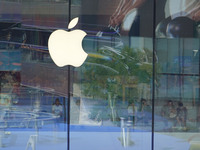 People experience products at the Apple flagship store at Taikoo Li in Sanlitun, a trendy fashion district in Beijing, China, on August 18,...