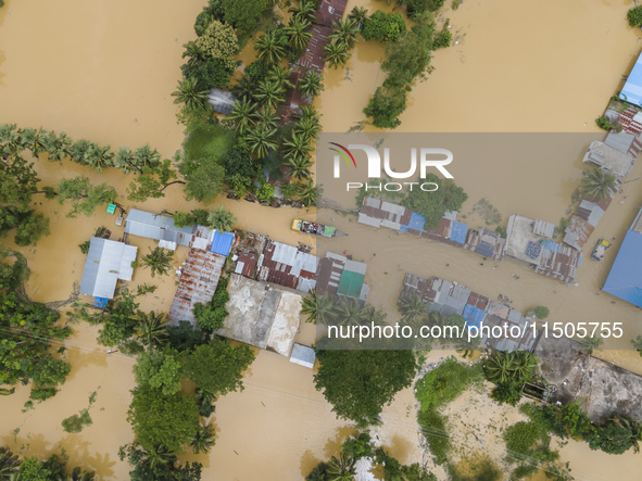 An aerial view of a flooded village in the Bishumier Hat area of Mirsarai Upazila, Chittagong Division, Bangladesh, on August 24, 2024. At l...