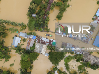 An aerial view of a flooded village in the Bishumier Hat area of Mirsarai Upazila, Chittagong Division, Bangladesh, on August 24, 2024. At l...