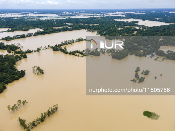 An aerial view of a flooded village in the Bishumier Hat area of Mirsarai Upazila, Chittagong Division, Bangladesh, on August 24, 2024. At l...