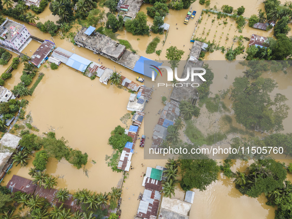 An aerial view of a flooded village in the Bishumier Hat area of Mirsarai Upazila, Chittagong Division, Bangladesh, on August 24, 2024. At l...