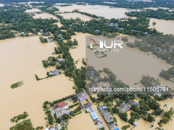 An aerial view of a flooded village in the Bishumier Hat area of Mirsarai Upazila, Chittagong Division, Bangladesh, on August 24, 2024. At l...