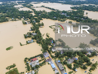 An aerial view of a flooded village in the Bishumier Hat area of Mirsarai Upazila, Chittagong Division, Bangladesh, on August 24, 2024. At l...