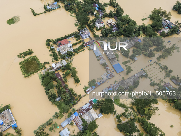 An aerial view of a flooded village in the Bishumier Hat area of Mirsarai Upazila, Chittagong Division, Bangladesh, on August 24, 2024. At l...