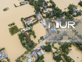 An aerial view of a flooded village in the Bishumier Hat area of Mirsarai Upazila, Chittagong Division, Bangladesh, on August 24, 2024. At l...